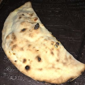 Gluten-free pizza calzone from Mama Eat!